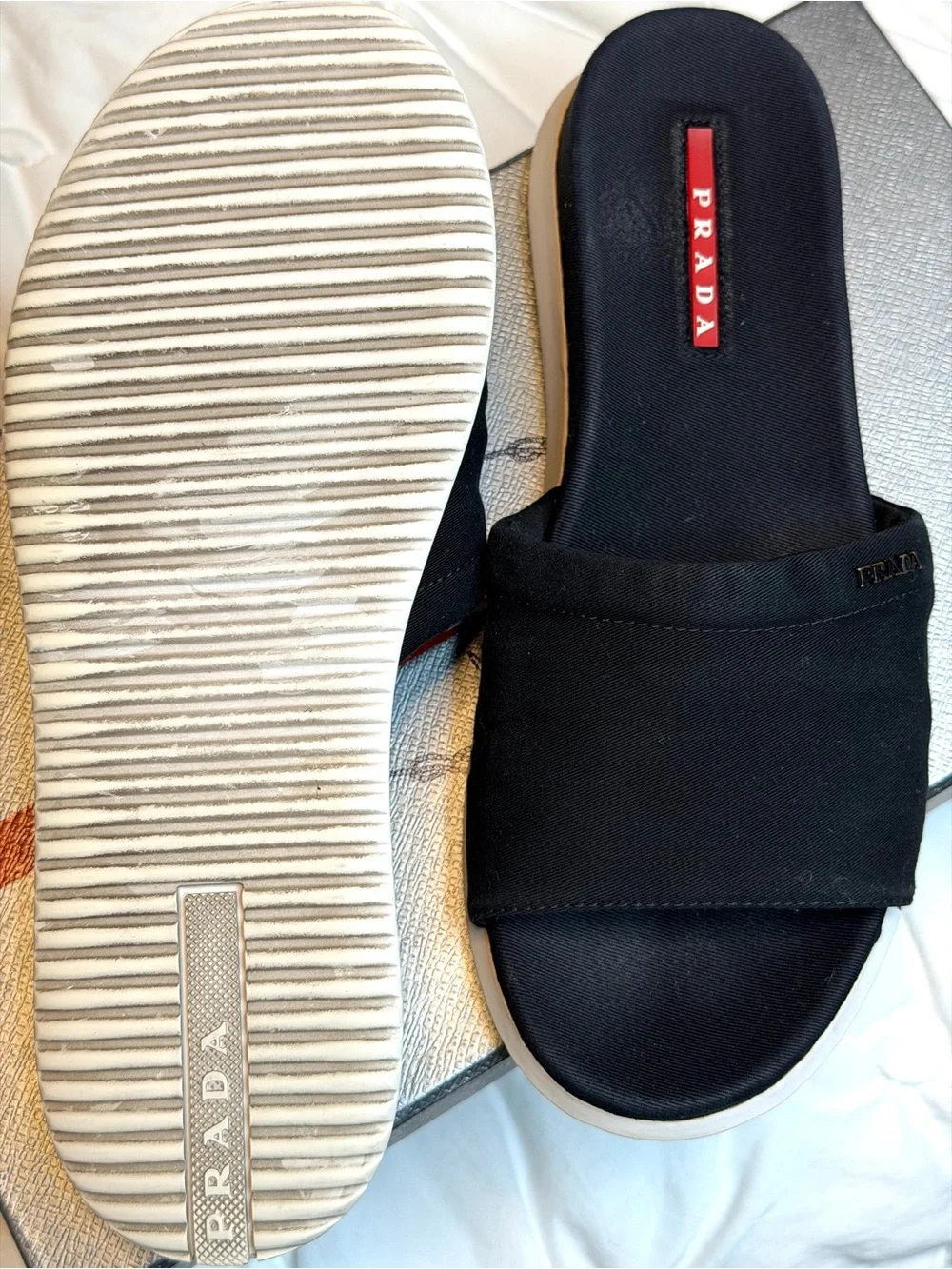 Prada Black Slides with White Soles and Red Logo Tag - Picture 3 of 3